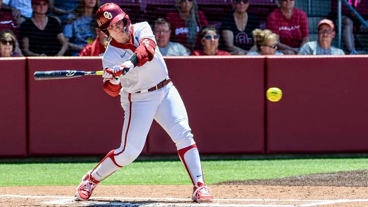 Oklahoma catcher Kendall Wells battles through an at-bat in an NCAA Tournament contest against Kansas at Love's Field.
