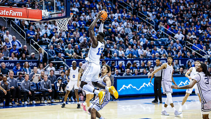 BYU basketball center Keba Keita rises up for a dunk against Kansas State BYU basketball center Keba Keita rises up for a dunk against Kansas State