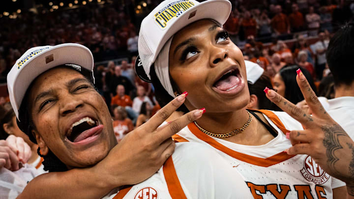 Texas Longhorns forwards Madison Booker (35) and Aaliyah Moore (23) regular season SEC Championship after beating Florida at home in the Moody Center, March 2, 2025.
