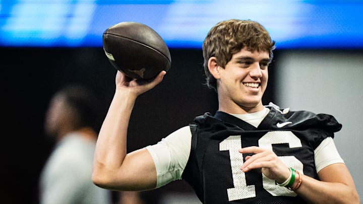 Texas quarterback Arch Manning warms up before a College Football Playoff game.