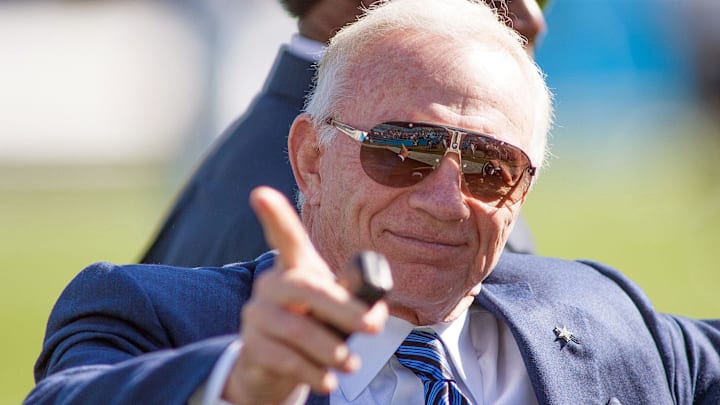Dallas Cowboys owner Jerry Jones points to the fans before the game against the Carolina Panthers.