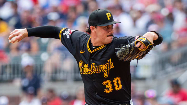 Jun 29, 2024; Cumberland, Georgia, USA; Pittsburgh Pirates pitcher Paul Skenes (30) pitches the ball against Atlanta Braves during the fifth inning at Truist Park.