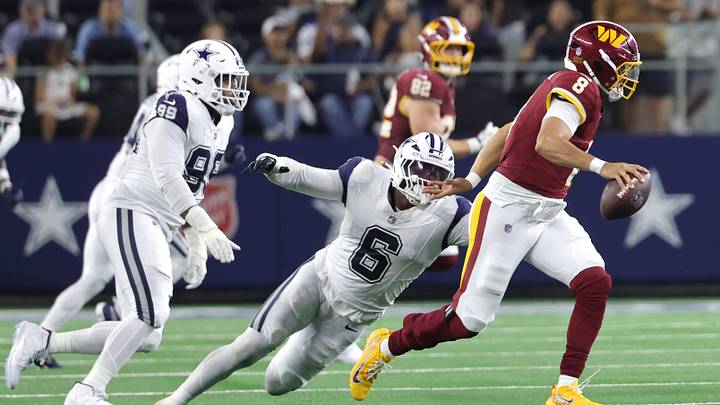 Sep 20, 2026; Arlington, Texas, USA; Washington Commanders quarterback Marcus Mariota (8) scrambles against Dallas Cowboys linebacker Donovan Ezeiruaku (6) during the fourth quarter at AT&T Stadium. Mandatory Credit: Kevin Jairaj-Imagn Images Sep 20, 2026; Arlington, Texas, USA; Washington Commanders quarterback Marcus Mariota (8) scrambles against Dallas Cowboys linebacker Donovan Ezeiruaku (6) during the fourth quarter at AT&T Stadium. Mandatory Credit: Kevin Jairaj-Imagn Images