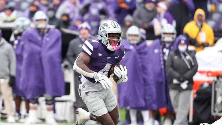 Nov 29, 2025; Manhattan, Kansas, USA; Kansas State Wildcats running back Joe Jackson (4) runs during the fourth against the Colorado Buffaloes at Bill Snyder Family Football Stadium. Mandatory Credit: Scott Sewell-Imagn Images Nov 29, 2025; Manhattan, Kansas, USA; Kansas State Wildcats running back Joe Jackson (4) runs during the fourth against the Colorado Buffaloes at Bill Snyder Family Football Stadium. Mandatory Credit: Scott Sewell-Imagn Images