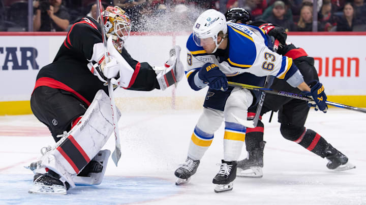 Oct 29, 2024; Ottawa, Ontario, CAN; Ottawa Senators goalie Linus Ullmark (35) makes a save on a shot from St. Louis Blues left wing Jake Neighbours (63) in the second period at the Canadian Tire Centre. Mandatory Credit: Marc DesRosiers-Imagn Images
