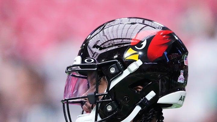 Oct 9, 2022; Glendale, Arizona, U.S.;  Arizona Cardinals quarterback Kyler Murray (1) wears the new black helmet style while warming up before playing against the Philadelphia Eagles at State Farm Stadium.

Nfl Eagles At Cardinals