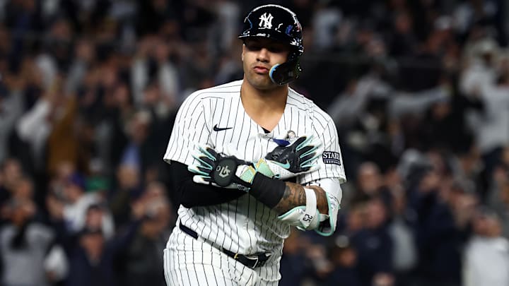 Oct 29, 2024; Bronx, New York, USA;  New York Yankees second baseman Gleyber Torres (25) reacts after hitting a three run home run against the Los Angeles Dodgers in the eighth inning during game four of the 2024 MLB World Series at Yankee Stadium. Mandatory Credit: Vincent Carchietta-Imagn Images