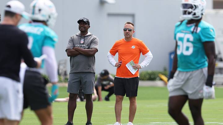 Miami Dolphins head coach Jeff Hafley watches minicamp with defensive quality control Coach Siriki Diabate at the Baptist Health Training Complex. Miami Dolphins head coach Jeff Hafley watches minicamp with defensive quality control Coach Siriki Diabate at the Baptist Health Training Complex.
