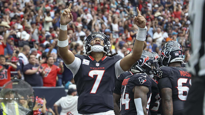 Sep 29, 2024; Houston, Texas, USA; Houston Texans quarterback C.J. Stroud (7) celebrates after a Texans touchdown during the fourth quarter against the Jacksonville Jaguars at NRG Stadium. Mandatory Credit: Troy Taormina-Imagn Images