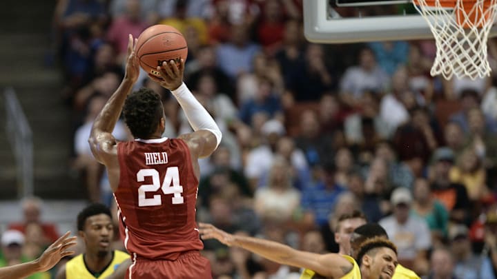 Oklahoma Sooners guard Buddy Hield shoots a basket against Oregon Ducks during the second half of the West regional final of the NCAA Tournament at Honda Center. Oklahoma Sooners guard Buddy Hield shoots a basket against Oregon Ducks during the second half of the West regional final of the NCAA Tournament at Honda Center.