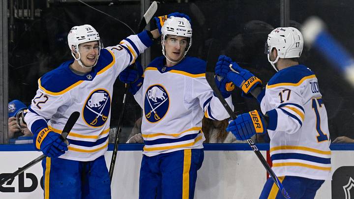 Buffalo Sabres forwards Jack Quinn, Ryan McLeod and Jason Zucker