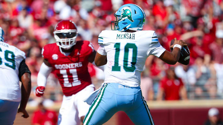Sep 14, 2024; Norman, Oklahoma, USA;  Tulane Green Wave quarterback Darian Mensah (10) throws during the second quarter against the Oklahoma Sooners at Gaylord Family-Oklahoma Memorial Stadium.