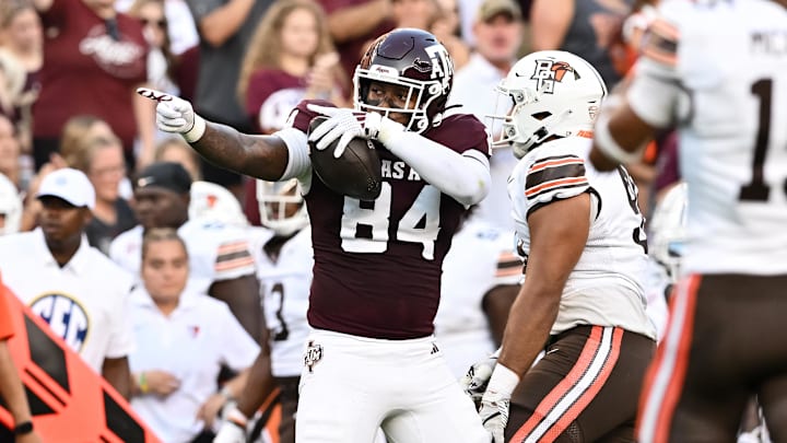 Sep 21, 2024; College Station, Texas, USA; Texas A&M Aggies tight end Tre Watson (84) motions after a first down during the first quarter against the Bowling Green Falcons at Kyle Field. 