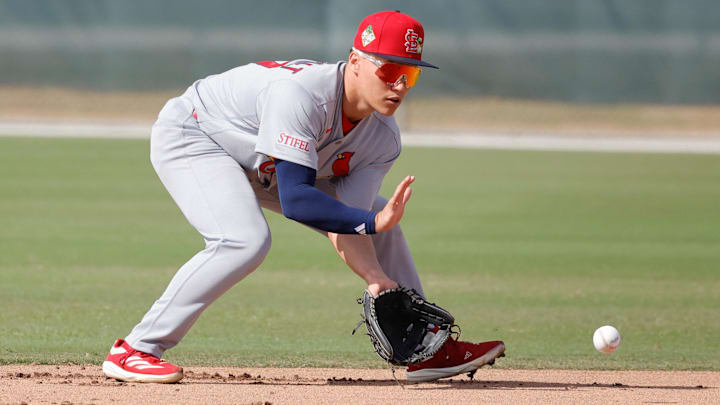 Feb 16, 2026; Jupiter, FL, USA;  St. Louis Cardinals infielder JJ Wetherholt (77) fields the ball during spring training workouts at Roger Dean Stadium. Mandatory Credit: Reinhold Matay-Imagn Images