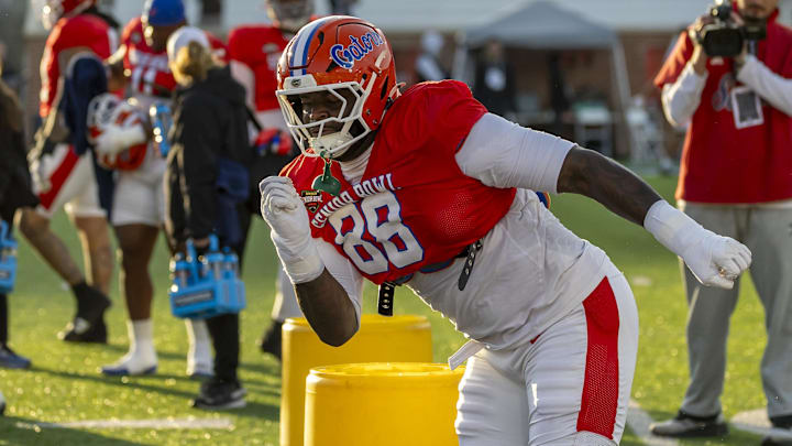 Jan 29, 2026; Mobile, AL, USA; American defensive tackle Caleb Banks (88) of Florida works in a drill during American Senior Bowl practice at Hancock Whitney Stadium.
