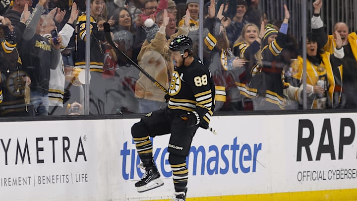 Dec 30, 2023; Boston, Massachusetts, USA; Boston Bruins right wing David Pastrnak (88) celebrates after scoring a goal during a game against the New Jersey Devils
