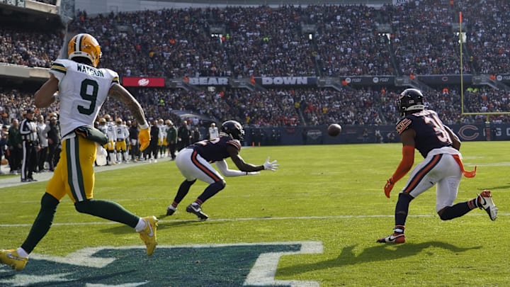 Terell Smith intercepts a pass against the Packers during the first half of Sunday's 20-19 loss at Soldier Field.