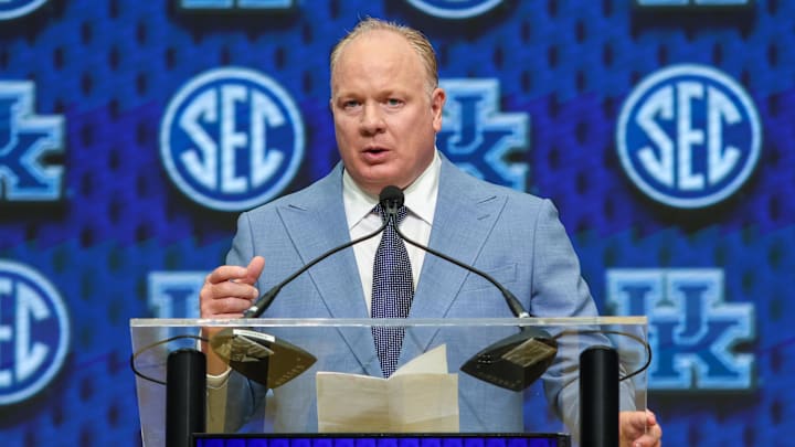 Jul 17, 2025; Atlanta, GA, USA; Kentucky Wildcats head coach Mark Stoops talks to the media during the SEC Media Days at Omni Atlanta Hotel. Mandatory Credit: Jordan Godfree-Imagn Images Jul 17, 2025; Atlanta, GA, USA; Kentucky Wildcats head coach Mark Stoops talks to the media during the SEC Media Days at Omni Atlanta Hotel. Mandatory Credit: Jordan Godfree-Imagn Images