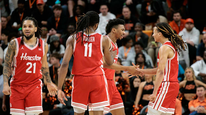 Mar 7, 2026; Stillwater, Oklahoma, USA; Houston Cougars guard Emanuel Sharp (21) and Houston Cougars guard Kingston Flemings (4) react after a play during the second half against the Oklahoma State Cowboys at Gallagher-Iba Arena. Mandatory Credit: William Purnell-Imagn Images Mar 7, 2026; Stillwater, Oklahoma, USA; Houston Cougars guard Emanuel Sharp (21) and Houston Cougars guard Kingston Flemings (4) react after a play during the second half against the Oklahoma State Cowboys at Gallagher-Iba Arena. Mandatory Credit: William Purnell-Imagn Images