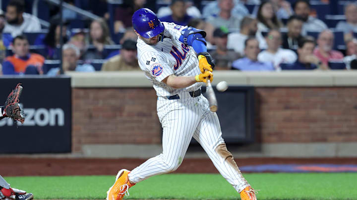 Sep 17, 2024; New York City, New York, USA; New York Mets first baseman Pete Alonso (20) hits a three run home run against the Washington Nationals during the sixth inning at Citi Field. 