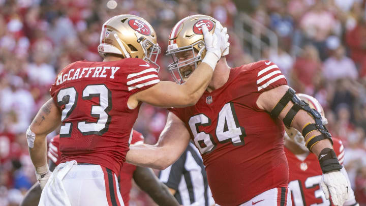 September 21, 2023; Santa Clara, California, USA; San Francisco 49ers running back Christian McCaffrey (23) is congratulated by center Jake Brendel (64) after scoring a touchdown against the New York Giants during the second quarter at Levi's Stadium. Mandatory Credit: Kyle Terada-USA TODAY Sports
