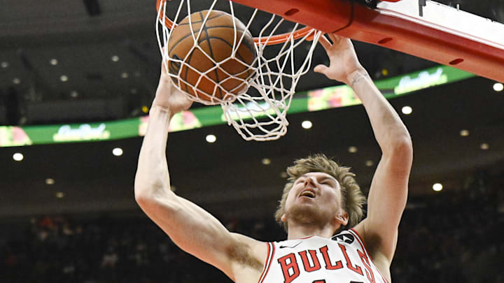 Dec 2, 2024; Chicago, Illinois, USA; Chicago Bulls forward Matas Buzelis (14) dunks against the Brooklyn Nets during the first half at the United Center. Mandatory Credit: Matt Marton-Imagn Images