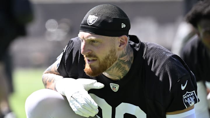Jun 10, 2025; Henderson, NV, USA; Las Vegas Raiders defensive end Maxx Crosby (98) looks on during the team stretch during Las Vegas Raiders Minicamp at Intermountain Health Performance Center. Mandatory Credit: Candice Ward-Imagn Images