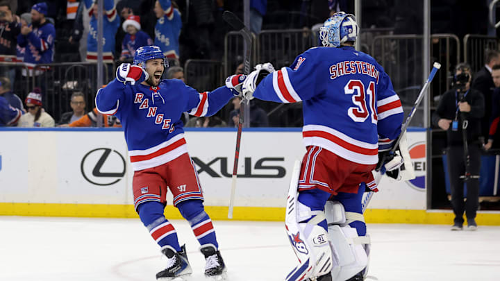 Dec 20, 2025; New York, New York, USA; New York Rangers center Vincent Trocheck (16) celebrates with goaltender Igor Shesterkin (31) after defeating the Philadelphia Flyers in a shootout at Madison Square Garden. Mandatory Credit: Brad Penner-Imagn Images