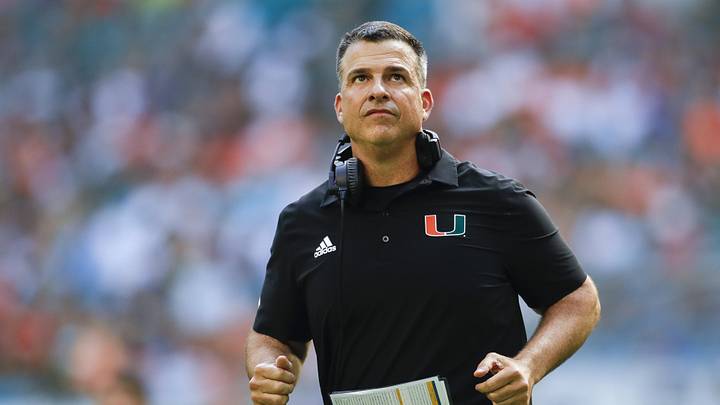 Oct 22, 2022; Miami Gardens, Florida, USA; Miami Hurricanes head coach Mario Cristobal runs on the field during the third quarter against the Duke Blue Devils at Hard Rock Stadium. Mandatory Credit: Sam Navarro-Imagn Images