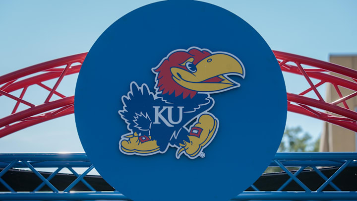 Oct 1, 2022; Lawrence, Kansas, USA; Kansas Jayhawks logo at entrance to the field prior to the game between the Kansas Jayhawks and the Iowa State Cyclones at David Booth Kansas Memorial Stadium. Mandatory Credit: William Purnell-Imagn Images
