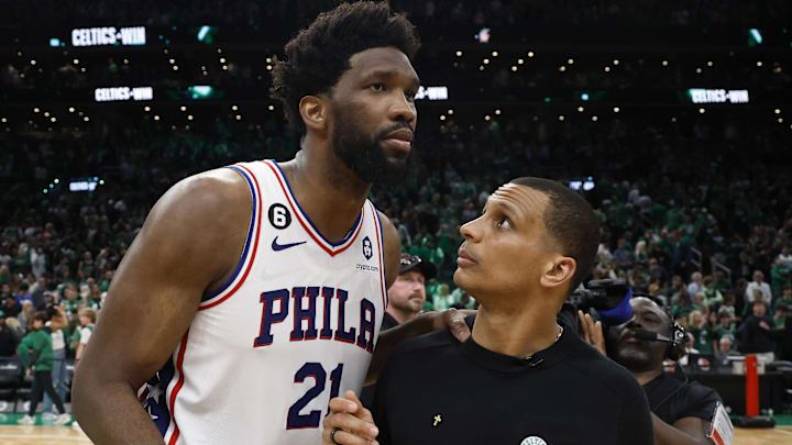 May 14, 2023; Boston, Massachusetts, USA; Boston Celtics head coach Joe Mazzulla talks with Philadelphia 76ers center Joel Embiid (21) after game seven of the 2023 NBA playoffs at TD Garden. Mandatory Credit: Winslow Townson-Imagn Images