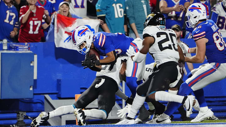 Sep 23, 2024; Orchard Park, New York, USA; Buffalo Bills wide receiver Khalil Shakir (10) runs with the ball after making a catch for a touchdown against Jacksonville Jaguars cornerback 	Christian Braswell (21) during the first half at Highmark Stadium 