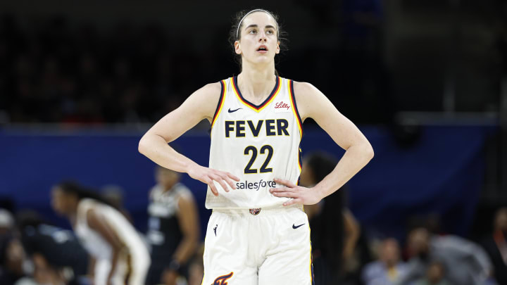 Jun 23, 2024; Chicago, Illinois, USA; Indiana Fever guard Caitlin Clark (22) walks on the court during the second half of a basketball game against the Chicago Sky at Wintrust Arena.