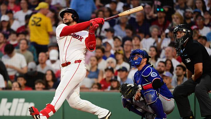 Jun 14, 2026; Boston, Massachusetts, USA;  Boston Red Sox first baseman Willson Contreras (40) hits a home run during the second inning against the Texas Rangers at Fenway Park. Mandatory Credit: Bob DeChiara-Imagn Images