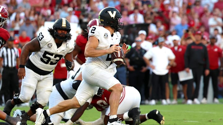 Oct 4, 2025; Tuscaloosa, Alabama, USA; Vanderbilt Commodores quarterback Diego Pavia (2) runs out of the pocket during the second half against the Alabama Crimson Tide at Saban Field at Bryant-Denny Stadium. Mandatory Credit: David Leong-Imagn Images