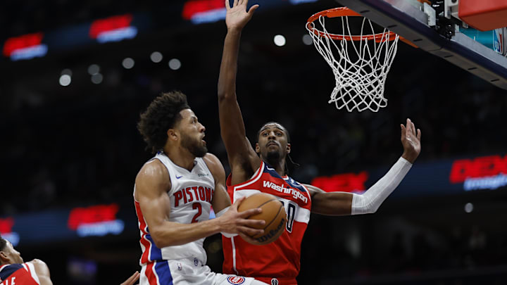 Nov 17, 2024; Washington, District of Columbia, USA; Detroit Pistons guard Cade Cunningham (2) shoots the ball as Washington Wizards forward Alexandre Sarr (20) defends in the first half at Capital One Arena. Mandatory Credit: Geoff Burke-Imagn Images