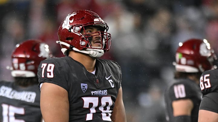 Nov 9, 2024; Pullman, Washington, USA; Washington State Cougars offensive lineman Fa'alili Fa'amoe (79) looks up at the video board against the Utah State Aggies in the second half at Gesa Field at Martin Stadium. Mandatory Credit: James Snook-Imagn Images
