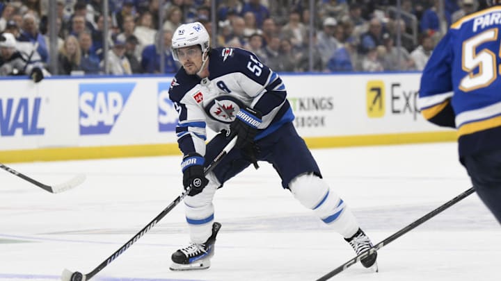 Apr 27, 2025; St. Louis, Missouri, USA; Winnipeg Jets center Mark Scheifele (55) skates against the St. Louis Blues during the first period in game four of the first round of the 2025 Stanley Cup Playoffs at Enterprise Center. Mandatory Credit: Jeff Le-Imagn Images