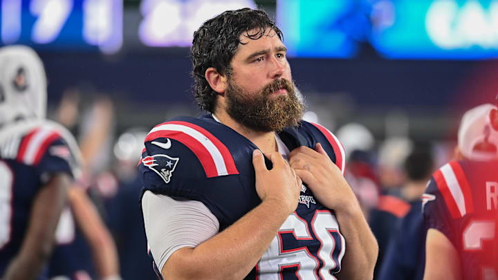 August 8, 2024; Foxborough, MA, USA; New England Patriots center David Andrews (60) watches from the sideline during the first half against the Carolina Panthers at Gillette Stadium. Mandatory Credit: Eric Canha-Imagn Images August 8, 2024; Foxborough, MA, USA; New England Patriots center David Andrews (60) watches from the sideline during the first half against the Carolina Panthers at Gillette Stadium. Mandatory Credit: Eric Canha-Imagn Images
