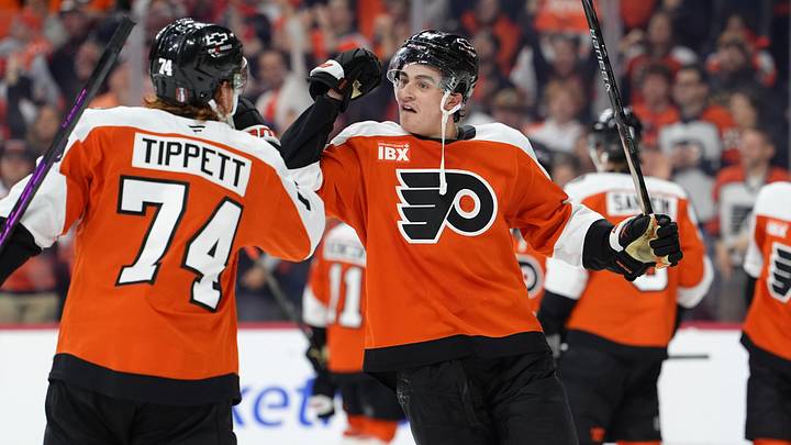 Apr 29, 2026; Philadelphia, Pennsylvania, USA; Philadelphia Flyers right wing Porter Martone (94) celebrates with right wing Owen Tippett (74) after game six of the first round of the 2026 Stanley Cup Playoffs against the Pittsburgh Penguins at Xfinity Mobile Arena. 