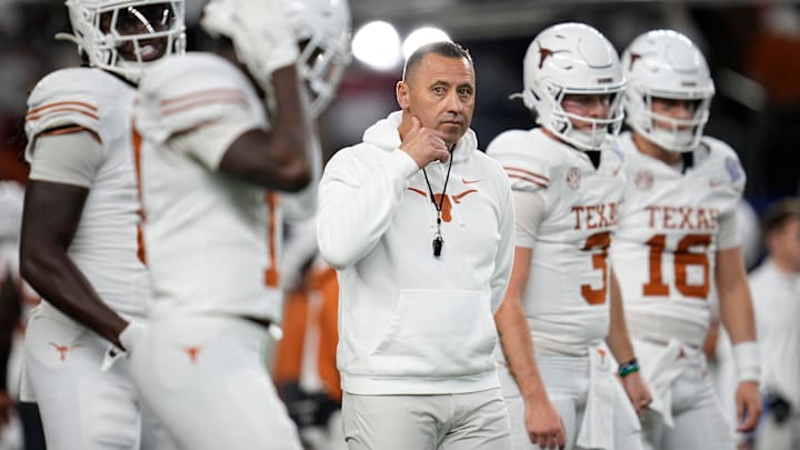 Texas Longhorns head coach Steve Sarkisian leads warm ups prior to the Cotton Bowl Classic College Football Playoff semifinal game between the Ohio State Buckeyes and the Texas Longhorns at AT&T Stadium in Arlington, Texas on Jan. 10, 2025.
