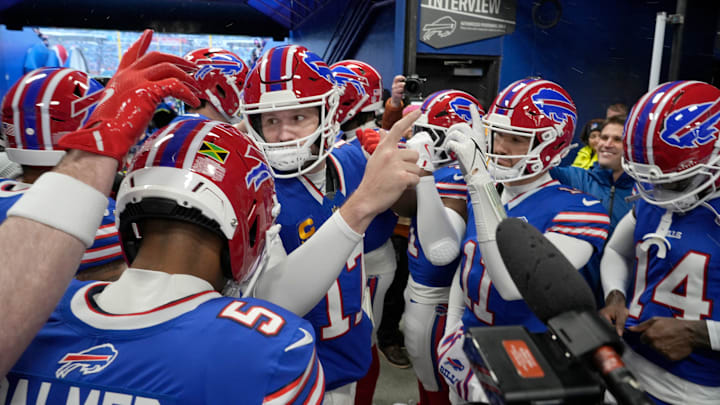 Buffalo Bills QB Josh Allen huddles up the offense in the players' tunnel before taking the field against the New York Jets.