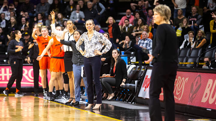 Princeton head coach Carla Berube looks down the court towards Iowa head coach Lisa Bluder as players on the Tigers' bench advocate for officials to call a foul on a 3-point basket attempt in overtime during an NCAA non-conference women's basketball game, Wednesday, Nov. 20, 2019, at Carver-Hawkeye Arena in Iowa City, Iowa.191120 Princeton Iowa Wbb 036 Jpg Princeton head coach Carla Berube looks down the court towards Iowa head coach Lisa Bluder as players on the Tigers' bench advocate for officials to call a foul on a 3-point basket attempt in overtime during an NCAA non-conference women's basketball game, Wednesday, Nov. 20, 2019, at Carver-Hawkeye Arena in Iowa City, Iowa.191120 Princeton Iowa Wbb 036 Jpg
