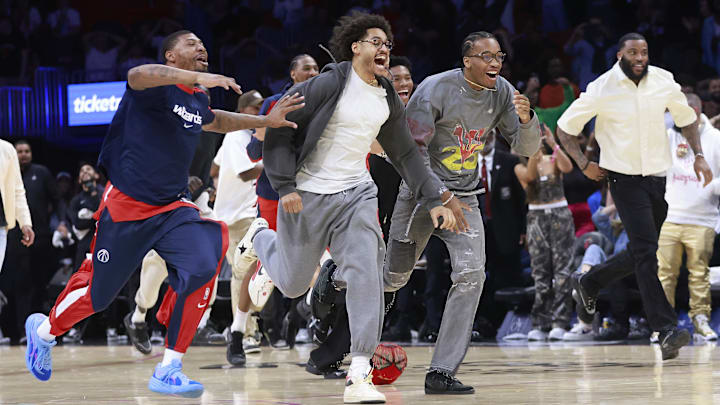 Apr 13, 2025; Miami, Florida, USA; The Washington Wizards bench celebrates the Wizards win against the Miami Heat at Kaseya Center. Mandatory Credit: Rhona Wise-Imagn Images