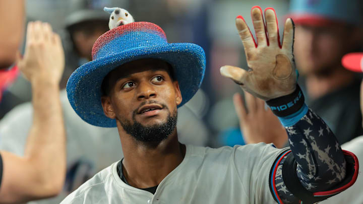 Miami Marlins shortstop Otto Lopez (6) celebrates with teammates after hitting a two-run home run.