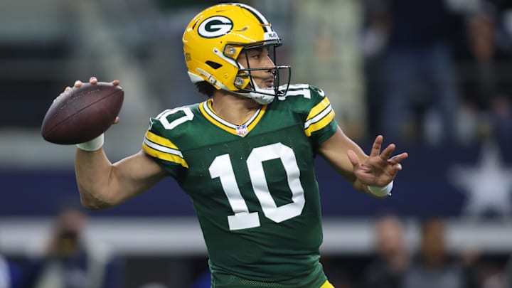 Jan 14, 2024; Arlington, Texas, USA;Green Bay Packers quarterback Jordan Love (10) drops back to