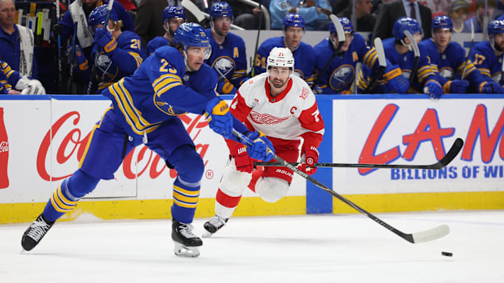 Mar 27, 2026; Buffalo, New York, USA; Detroit Red Wings center Dylan Larkin (71) looks to defend as Buffalo Sabres defenseman Owen Power (25) makes a pass during the first period at KeyBank Center. Mandatory Credit: Timothy T. Ludwig-Imagn Images Mar 27, 2026; Buffalo, New York, USA; Detroit Red Wings center Dylan Larkin (71) looks to defend as Buffalo Sabres defenseman Owen Power (25) makes a pass during the first period at KeyBank Center. Mandatory Credit: Timothy T. Ludwig-Imagn Images