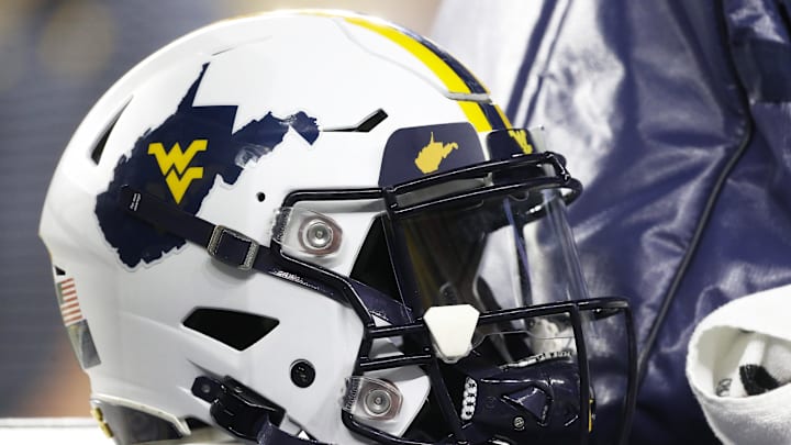 Sep 1, 2022; Pittsburgh, Pennsylvania, USA;  A West Virginia Mountaineers helmet on the sidelines against the Pittsburgh Panthers during the fourth quarter at Acrisure Stadium. Mandatory Credit: Charles LeClaire-Imagn Images