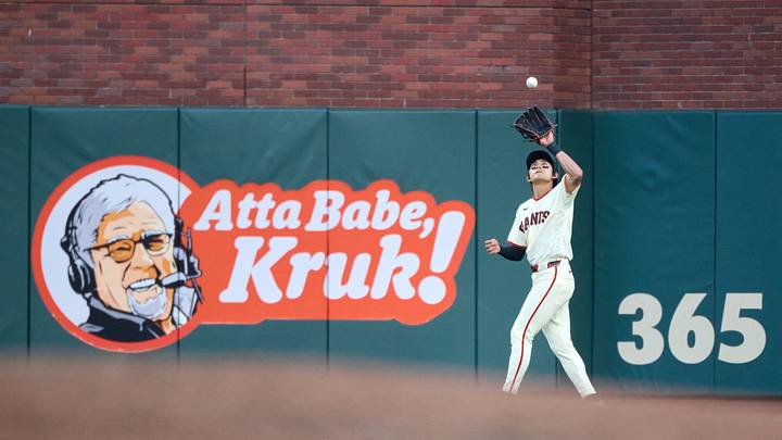 Sep 13, 2026; San Francisco, California, USA; San Francisco Giants outfielder Jung Hoo Lee (51) catches a deep fly ball hit by San Diego Padres infielder Manny Machado (not pictured) during the seventh inning at Oracle Park. Mandatory Credit: Robert Edwards-Imagn Images