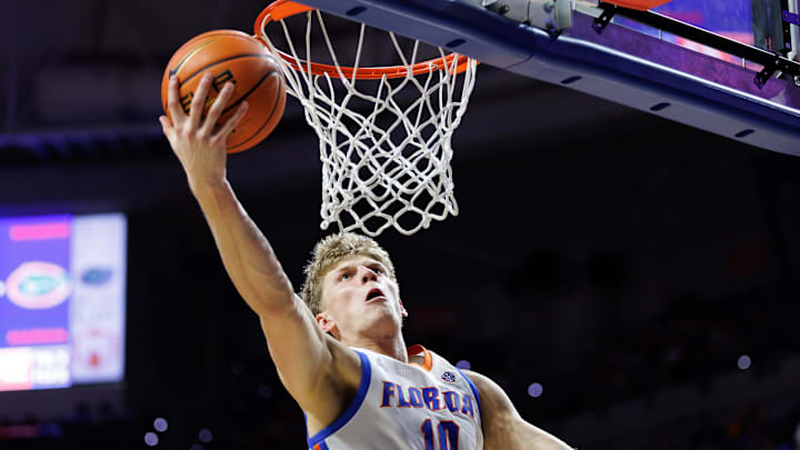 Feb 17, 2026; Gainesville, Florida, USA; Florida Gators forward Thomas Haugh (10) attempts a layup against the South Carolina Gamecocks during the second half at Exactech Arena at the Stephen C. O'Connell Center.